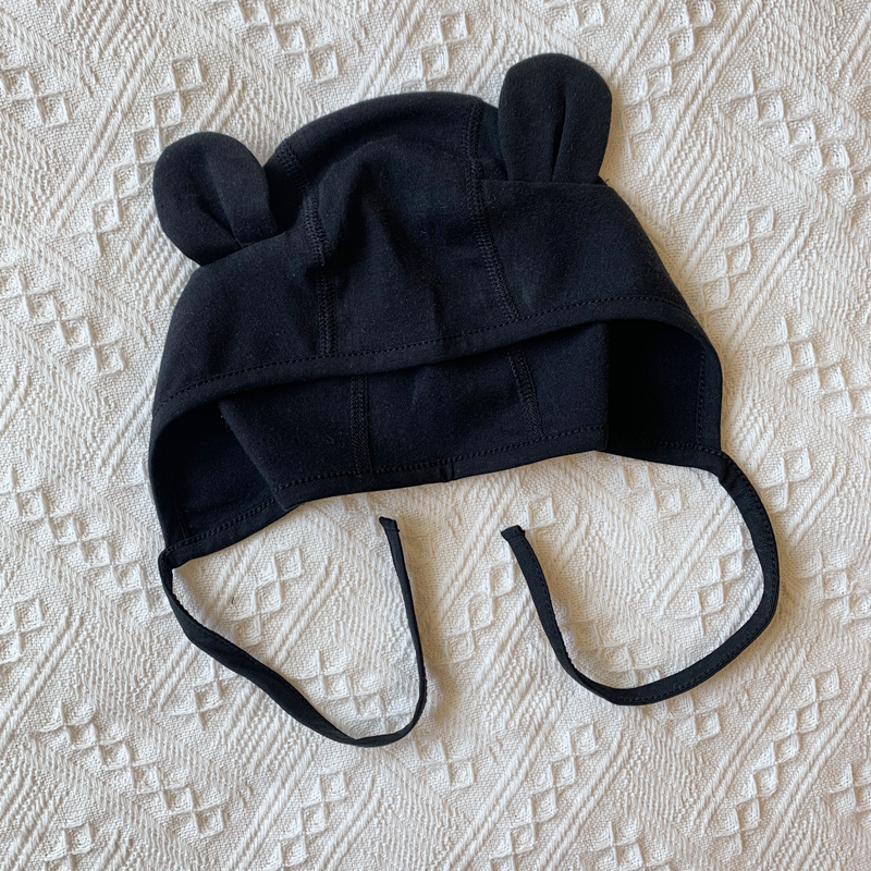 黑色婴儿男女宝宝属年帽休闲纯棉保暖透气防风系带帽护耳造型新款
